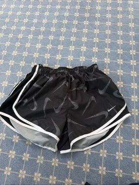 Nike Black Shorts with White Trim and Grey Swoosh Pattern